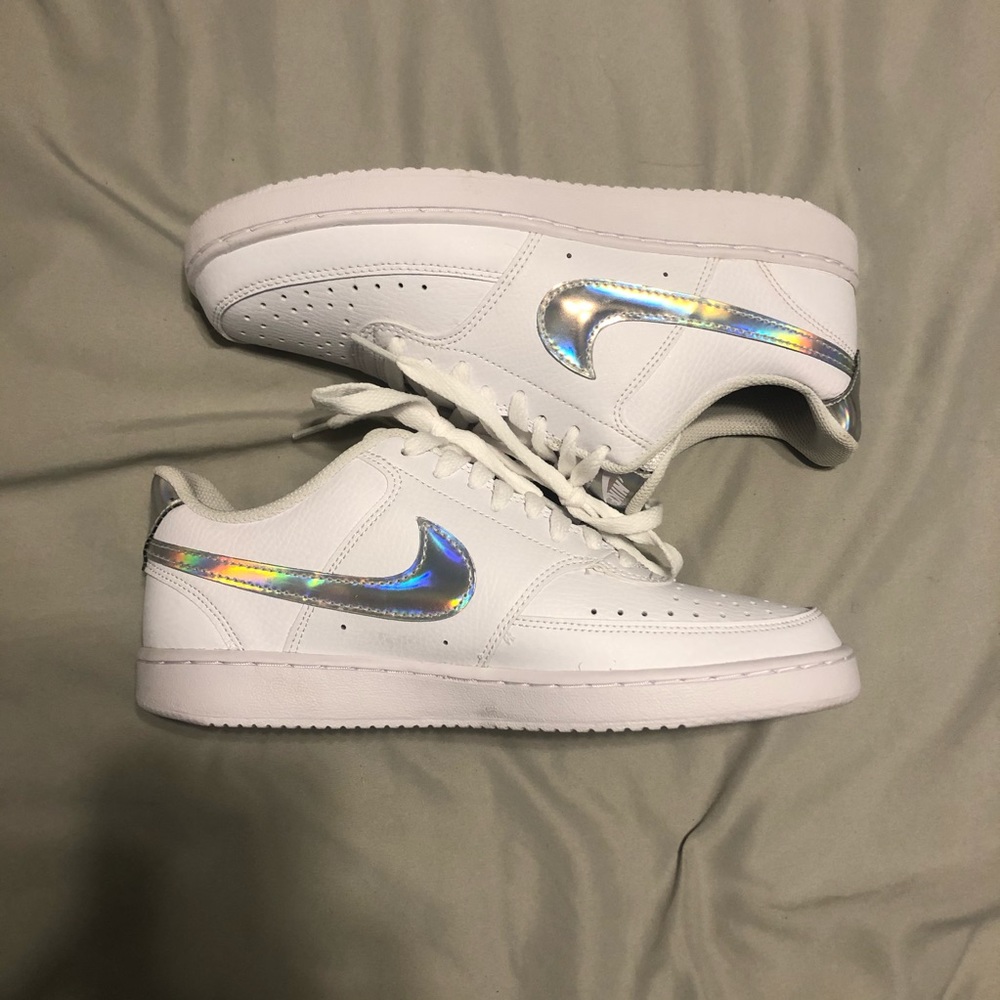 Nike sneakers with holographic swish